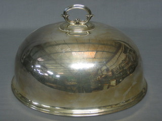 An oval silver plated meat cover