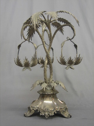 A 19th Century silver plated table centre piece in the form of palm trees hung 3 leaf shaped baskets (no liners), raised on Rococo style panelled supports 21"