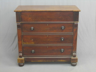 A Victorian mahogany chest fitted a secret drawer above 3 long drawers with swirl decoration 45"