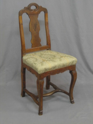 An 18th/19th Century French walnut chair with vase shaped slat back and upholstered seat, raised on cabriole supports