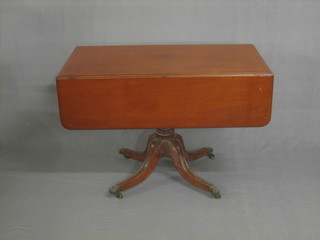 A 19th Century mahogany pedestal Pembroke table fitted 2 frieze drawers, raised on a tripod base ending in paw, caps and castors 40"