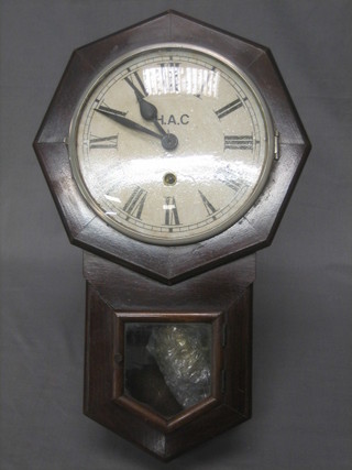 A wall clock with Roman numerals contained in a mahogany case the dial marked HAC
