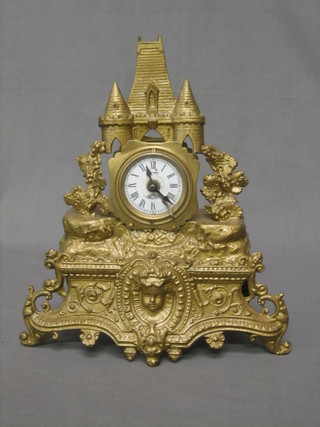 A 19th Century Continental mantel clock contained in a gilt painted case, in the form of a  castle