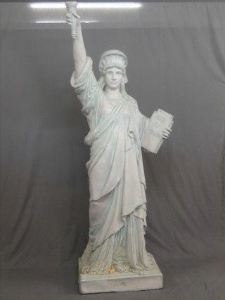 A fibre glass figure of the Statue of Liberty 88"