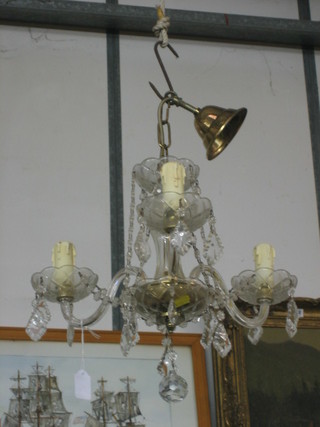 A glass 3 light electrolier hung lozenges