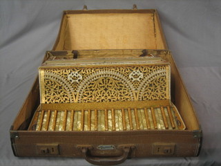 A highly ornate Settimio Soprani Cardinal accordion with 120 buttons and with gilt decoration