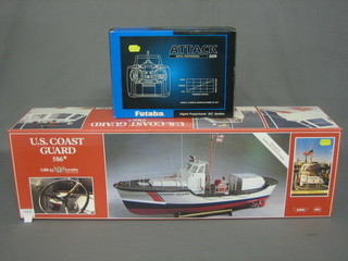 A radio controlled model US Coast Guard 586 launch together with an Attrack 2DR control unit
