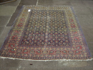 A Persian carpet with all-over geometric design 76" x 54"