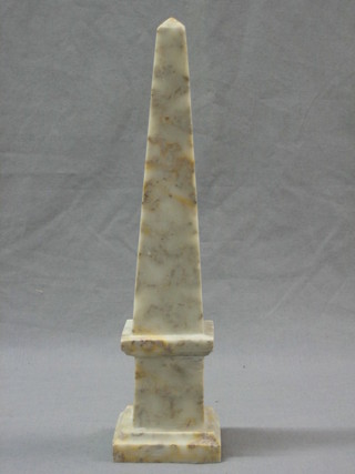 A marble finished obelisk 12"