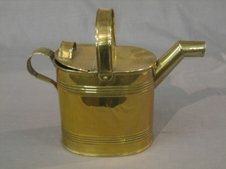 A Victorian oval brass hotwater carrier