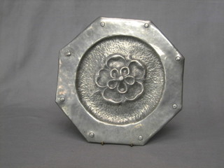 An Art Nouveau style octagonal embossed pewter dish decorated a Tudor Rose 9 1/2"