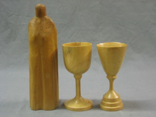 2 turned beech chalice 6" and a carved wooden figure 10"