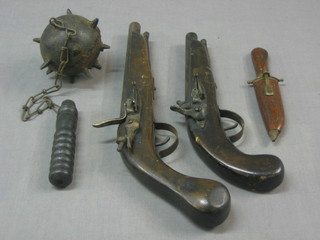 2 reproduction flint lock pistols, together with a small Eastern dagger