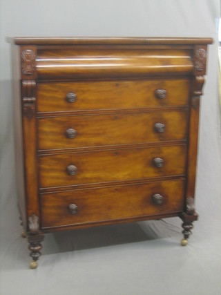 A Victorian mahogany Scotts Baronial chest fitted 1 long secret drawer above 4 long drawers with scrolled decoration to the side 46"
