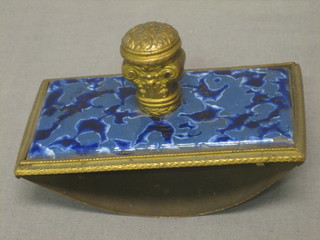 A rectangular gilt metal and blue enamelled blotter