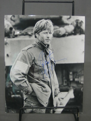 A signed black and white photograph of Robert Redford 10" x 8 1/2"
