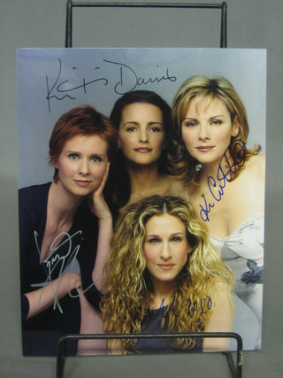A colour photograph signed by the cast of Sex And The City 10" x 8"