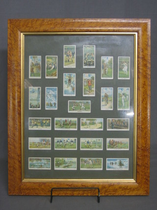 25 Turf cigarette cards "Sports Records" contained in a walnut frame
