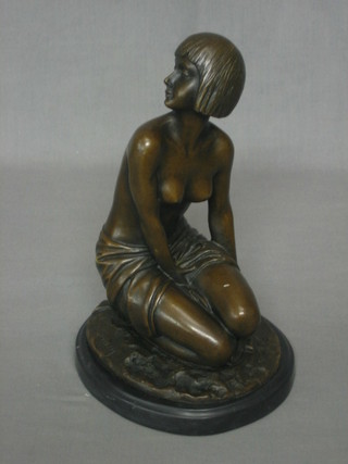 A reproduction Art Deco style bronze figure of a semi-naked lady, raised on a marble base 10"