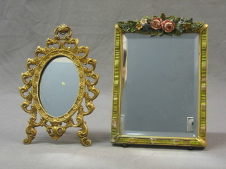 A rectangular bevelled plate mirror with Barbola mounts 8" x 6" and a circular easel mirror contained in a gilt frame 9"