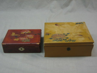 A red Eastern lacquered box with hinged lid 7" and a brown ditto 8"
