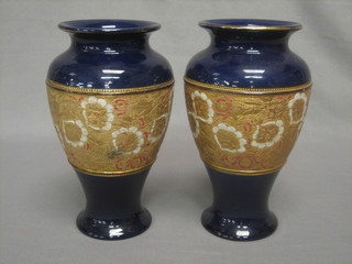 A pair of Royal Doulton blue salt glazed vases 9"