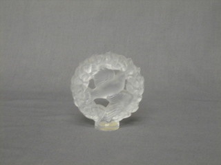 A Lalique circular glass ornament in the form of a dove within Laurel leaves 3"