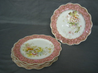 6 Doulton Burslem circular dessert plates with pink and gilt banding and floral decoration, the reverse marked Doulton Burslem RA26.C4976 (3 chipped)