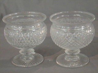 A pair of Irish Georgian circular pedestal cut glass bowls, raised on spreading feet 5"