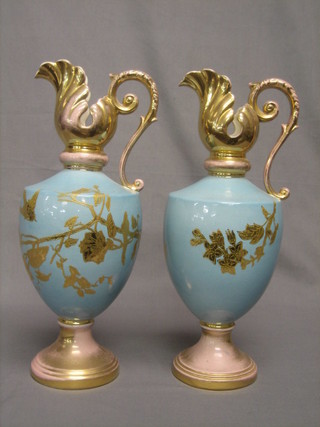 A pair of Victorian turquoise and gilt pattern ewers 40"