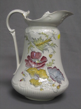 A pottery ewer with floral decoration 12"