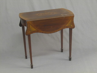 An Edwardian Georgian style inlaid mahogany Pembroke table of serpentine outline, fitted a frieze drawer and raised on square tapering supports ending in spade feet, 28"