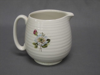 A Beswick Pottery jug with floral decoration, the base marked 2651 5"