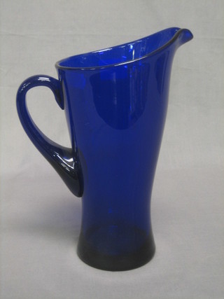 A "Bristol Blue" glass jug 9"