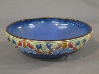 A circular Royal Doulton bowl, the base marked Royal Doulton and impressed X8865, 13773 and incised JH 12" (cracked)