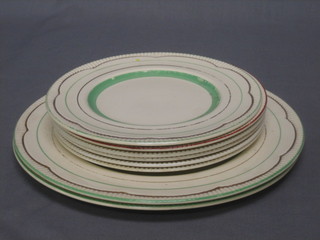 2 circular Clarice Cliff white glazed pottery plates with green banding 9" and 6 side plates 6 1/2"