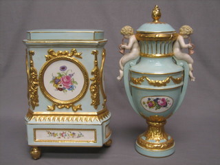 A reproduction turquoise and floral patterned porcelain urn and cover decorated 2 cherubs 16" together with a rectangular shaped ornament with floral decoration (f)