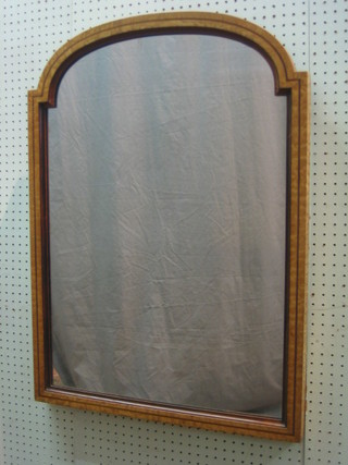 A Victorian arched plate mirror contained in a "Pollard" oak frame 32"