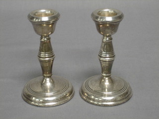 A modern pair of silver candlesticks 4"