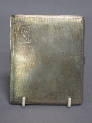 A silver cigarette case with engine turned decoration Birmingham 1913 6 ozs