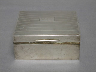 A square silver cigarette box with hinged lid 4", Birmingham 1929