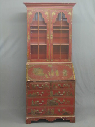 A 1930's chinoiserie style red lacquered bureau bookcase, the upper section with moulded cornice, the interior fitted adjustable shelves, the fall front revealing a well fitted interior above 2 short and 3 long graduated drawers, raised on bracket feet 32"