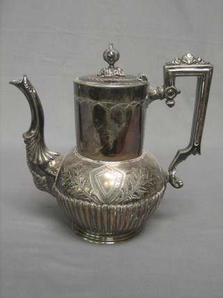A Victorian engraved Britannia metal coffee pot