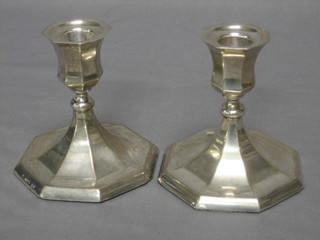 A pair of Continental silver candlesticks, raised on octagonal bases, marked 925S 4"