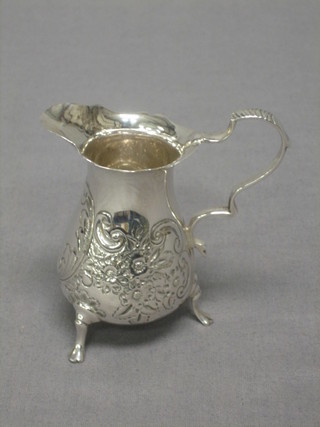 A Victorian silver cream jug with engraved decoration Sheffield 1894, 1 ozs