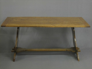 An oak refectory dining table with H framed stretcher 65"