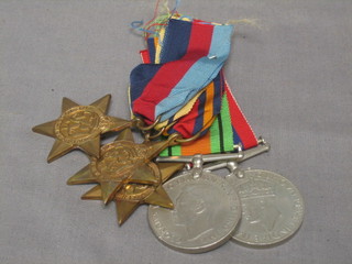 A group of 5 medals comprising 1939-45 Star, Africa Star, Burma Star, Defence and War medal together with original presentation box