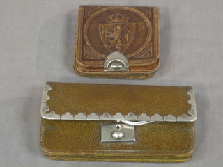 A leather purse with silver mounts together with 1 other purse