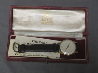 A gentleman's gold cased wristwatch by Zenith