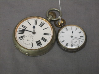 An 8 day pocket watch contained in a silver plated case and an open faced pocket watch contained in a gun metal case (2)